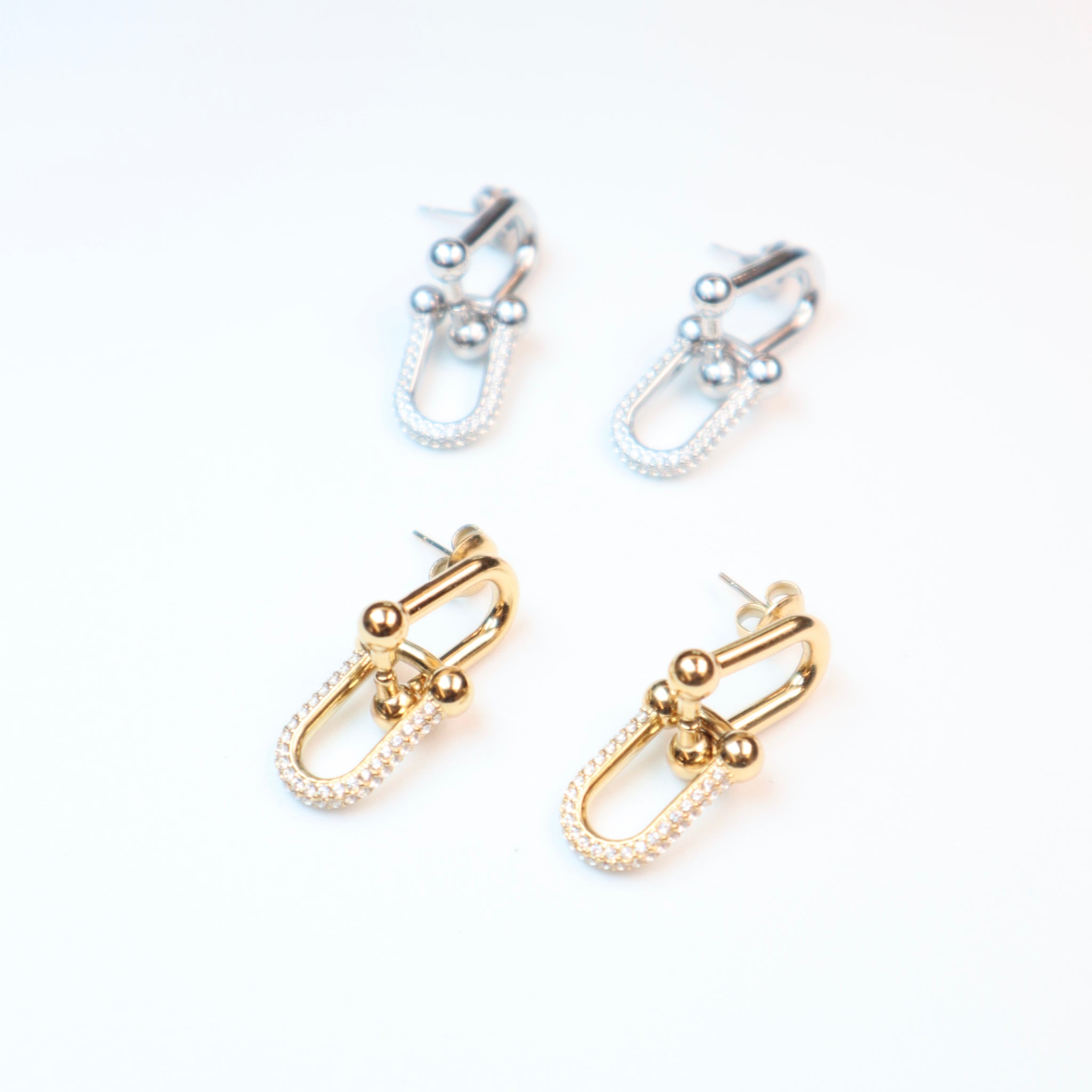 Orecchini catena con zirconi